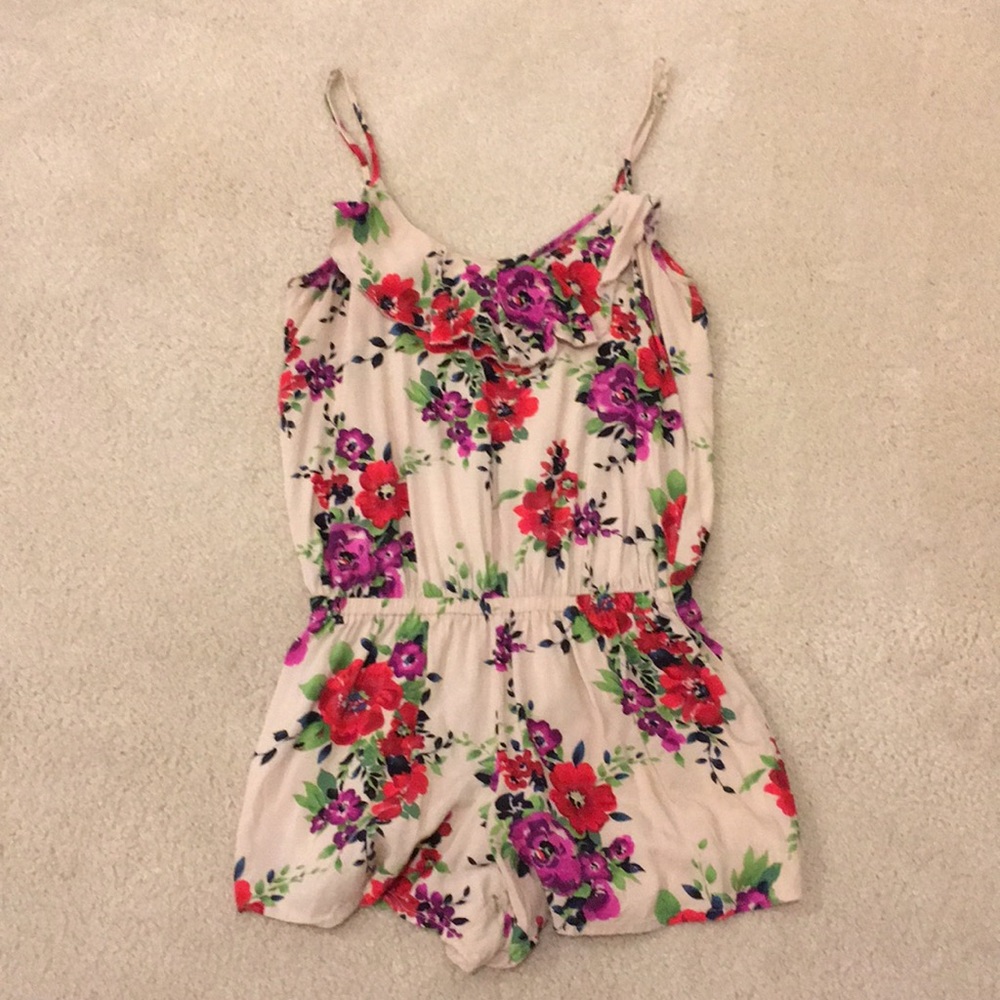 Belle de Jour floral romper with ruffle neckline